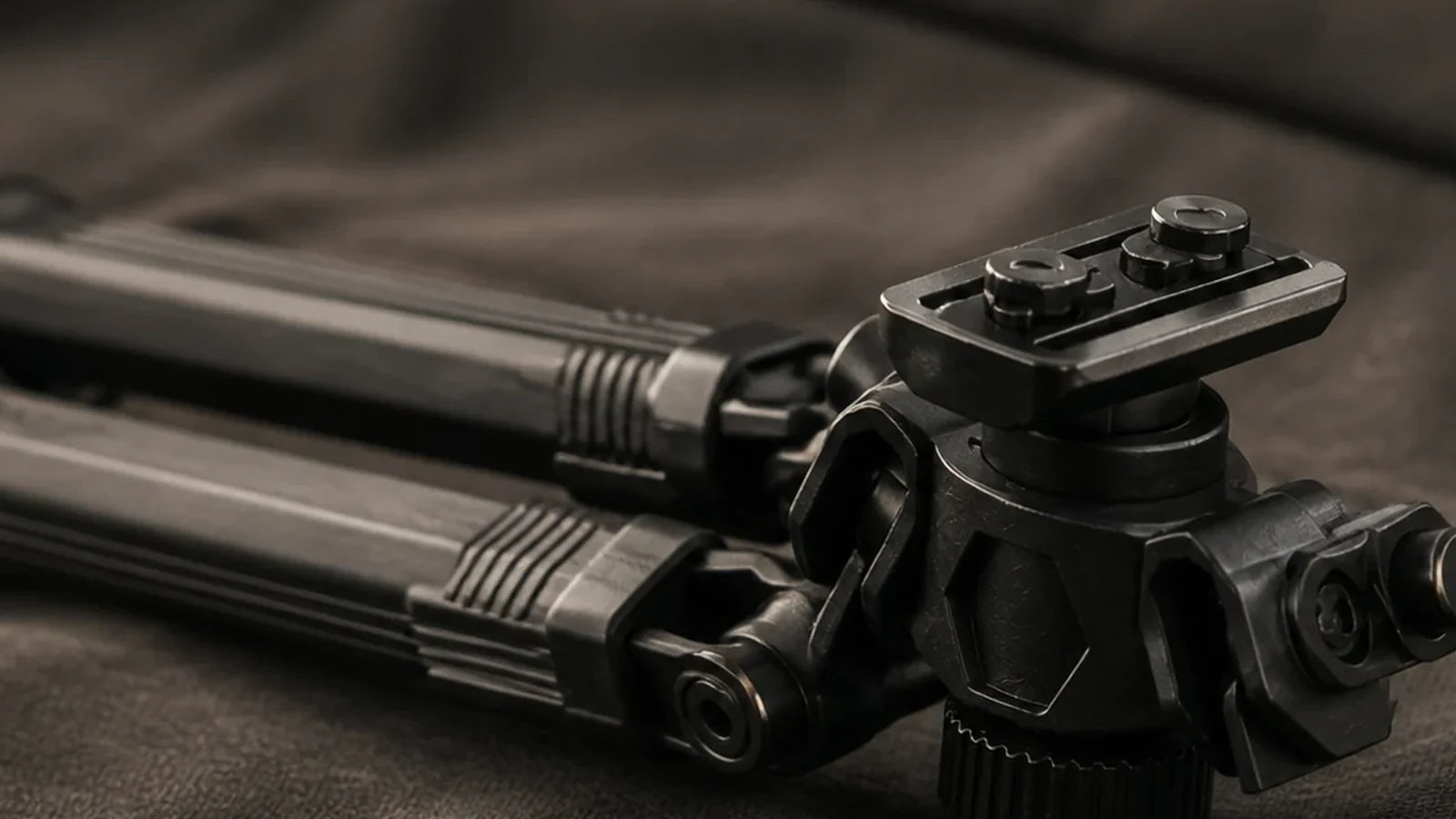 Close engineering detail of the RETACKIT bipod mount and folding mechanism