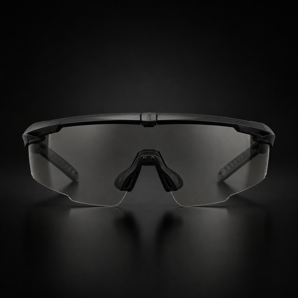 Black tactical goggles, front view, transparent lenses, adjustable nose pad, protective eyewear for outdoor, CS, and field combat.