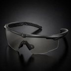 Black tactical goggles, 45-degree view, highlighting frame, transparent lenses, adjustable nose pad, e-commerce protective eyewear for CS and outdoor use.