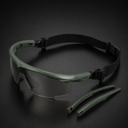 Flat lay of black tactical goggles with adjustable strap, transparent lenses, anti-slip nose pad, complete protective eyewear kit for outdoor, CS, and field combat.
