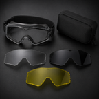 RETACKIT Tactical Assault Goggles Pro with three interchangeable lenses (Clear, Smoke, Yellow) and black protective carry case, neatly arranged on dark premium background. Ecommerce product display, tactical and airsoft ready.